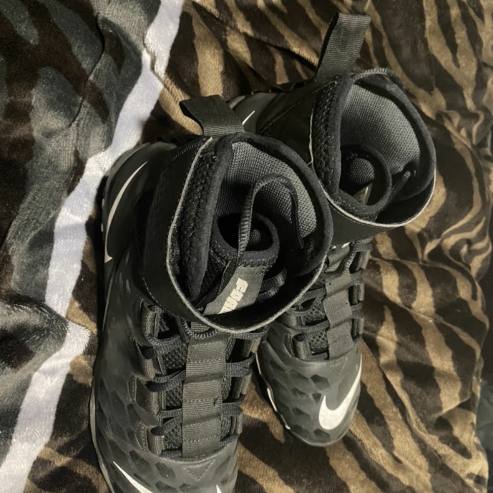 Black Nike football cleats (9.5)
